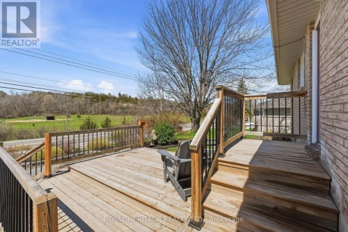 **Front Deck Overlooks Serene Pasture Land**