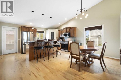Spacious kitchen & dining area. Door to rear deck