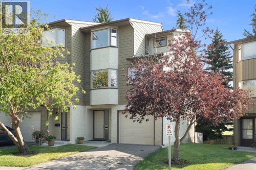 Attached single garage on beautifully  landscaped frontage